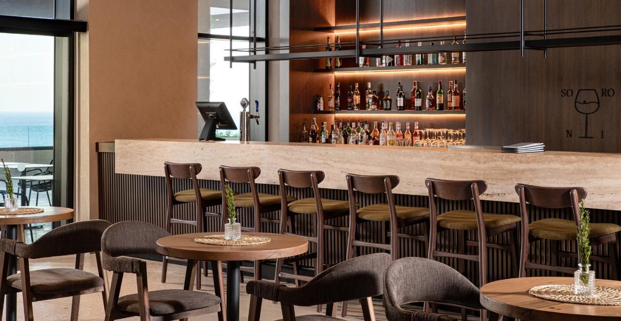 Helea Lifestyle Beach Resort Kallithéa Esterno foto The bar at the hotel